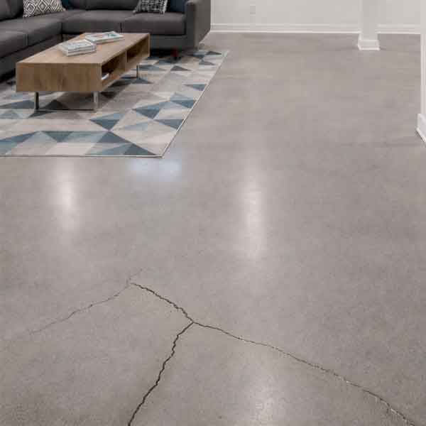 Concrete floor repairs include repairing floor cracks.